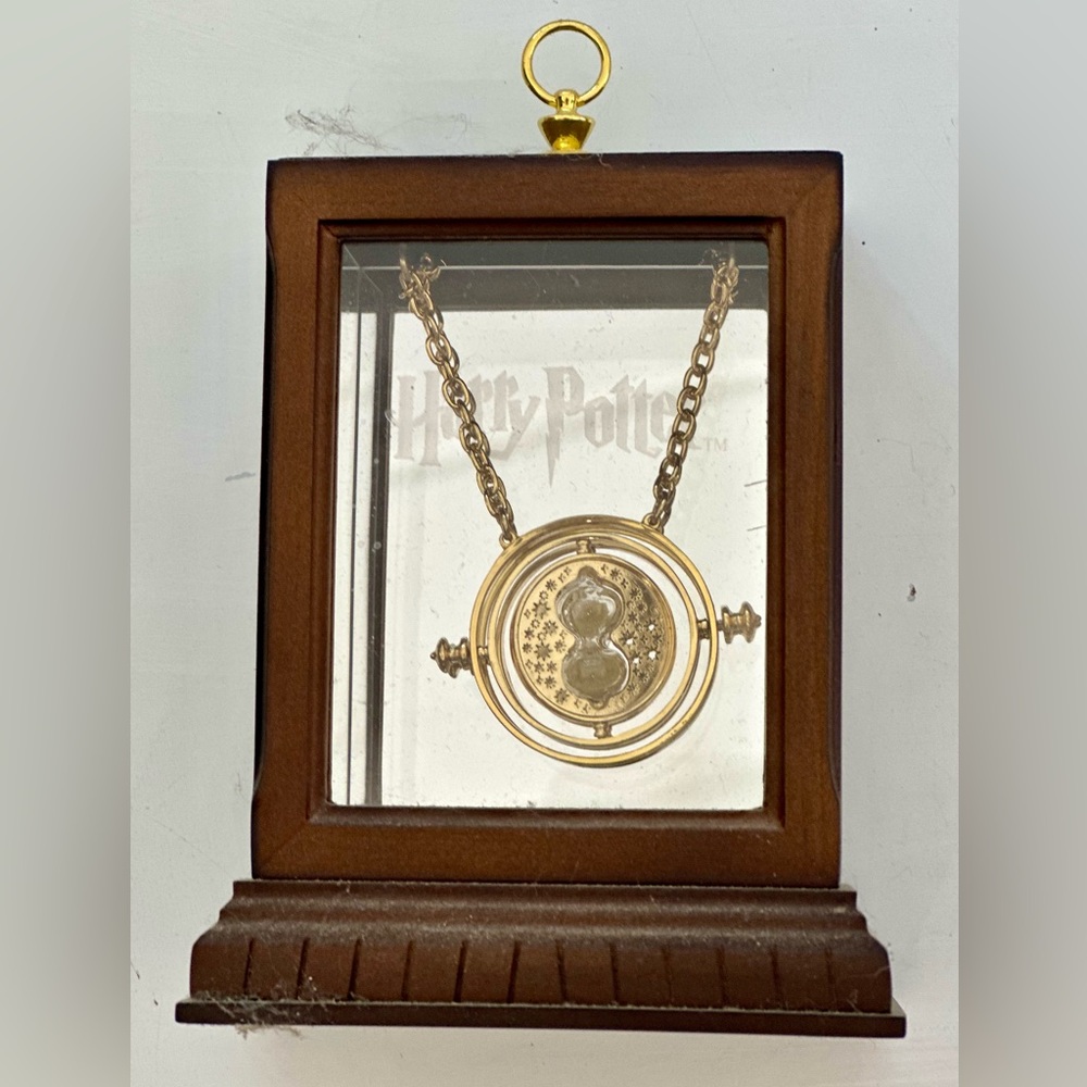 Noble collection brand Harry Potter time turner with display case